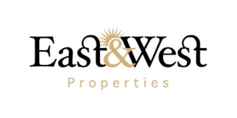 East and West Properties logo